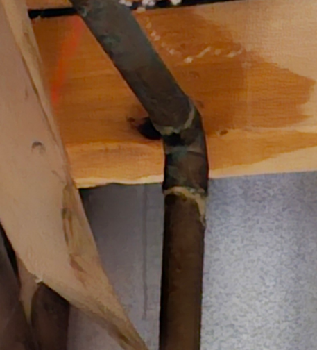 The L joint had sprung a very small leak, but the water main is under high pressure, so it was spraying a stream of water into our laundry room.